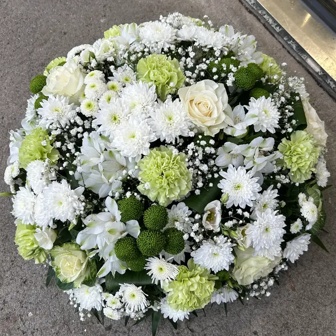 Pièce ronde blanche et verte
